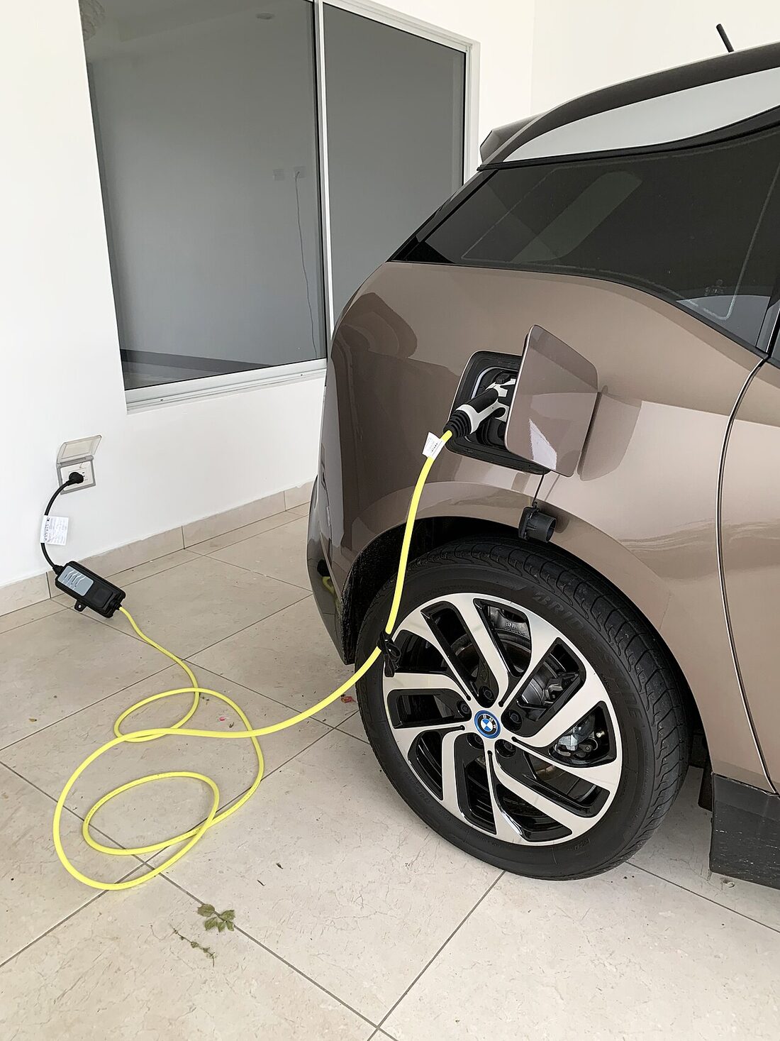 An EV charging from a household 120V outlet